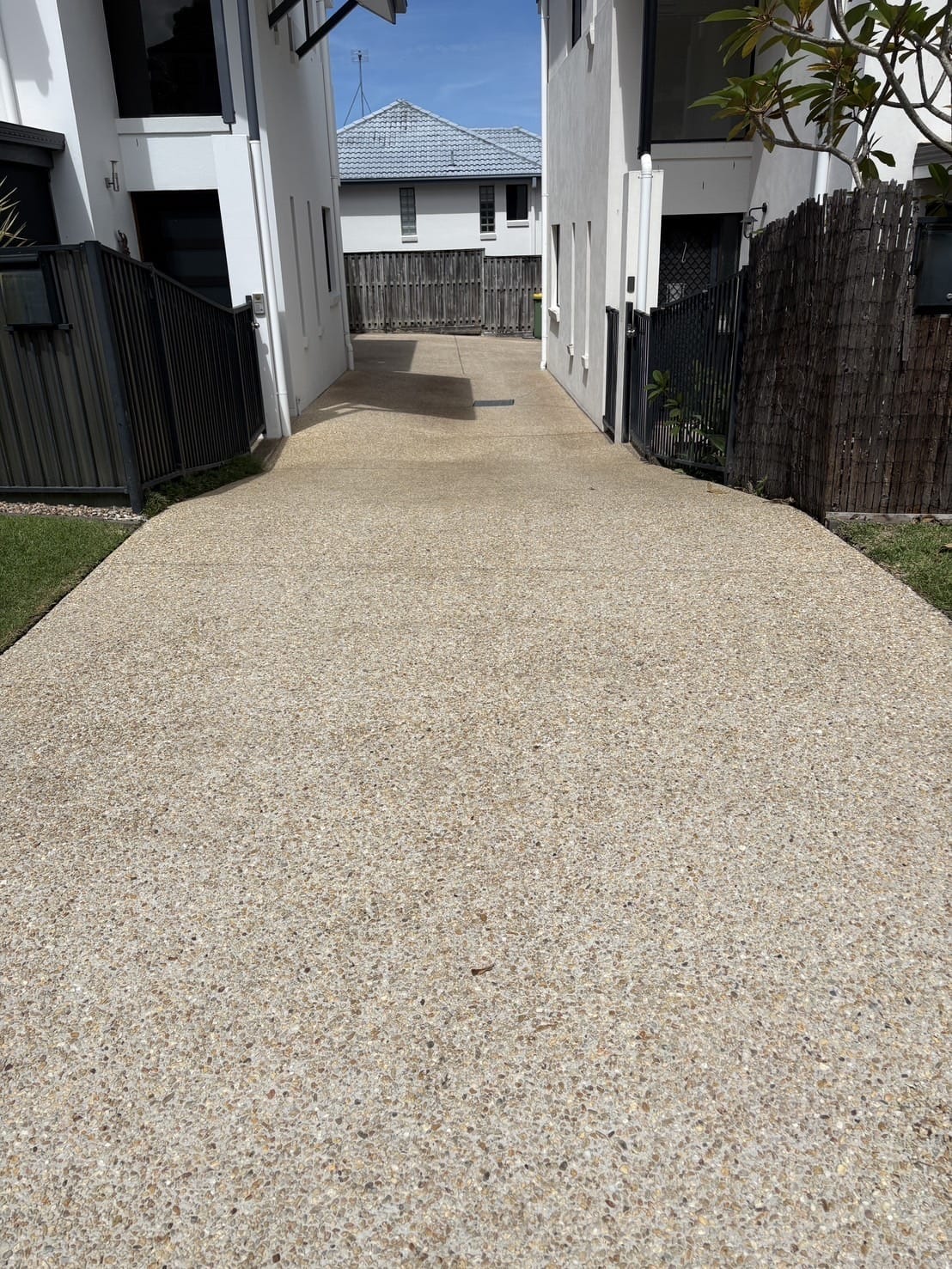 Exposed aggregate driveway after pressure cleaning